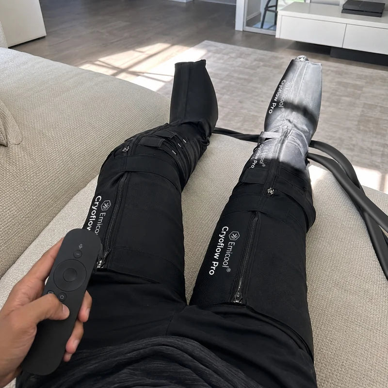 Home-M010_Resting_on_Sofa_with_Leg_Compression_Boots_and_TV_Remote_-Pages-EMICOOL